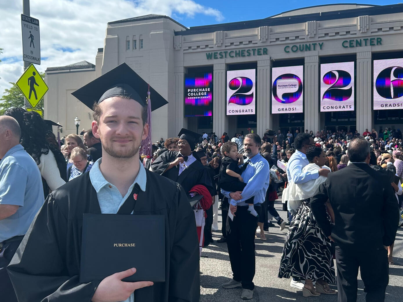 Holding my degree immediately after the SUNY Purchase College Graduation Ceremony, 5/15/26 Holding my degree immediately after the SUNY Purchase College Graduation Ceremony, 5/15/26